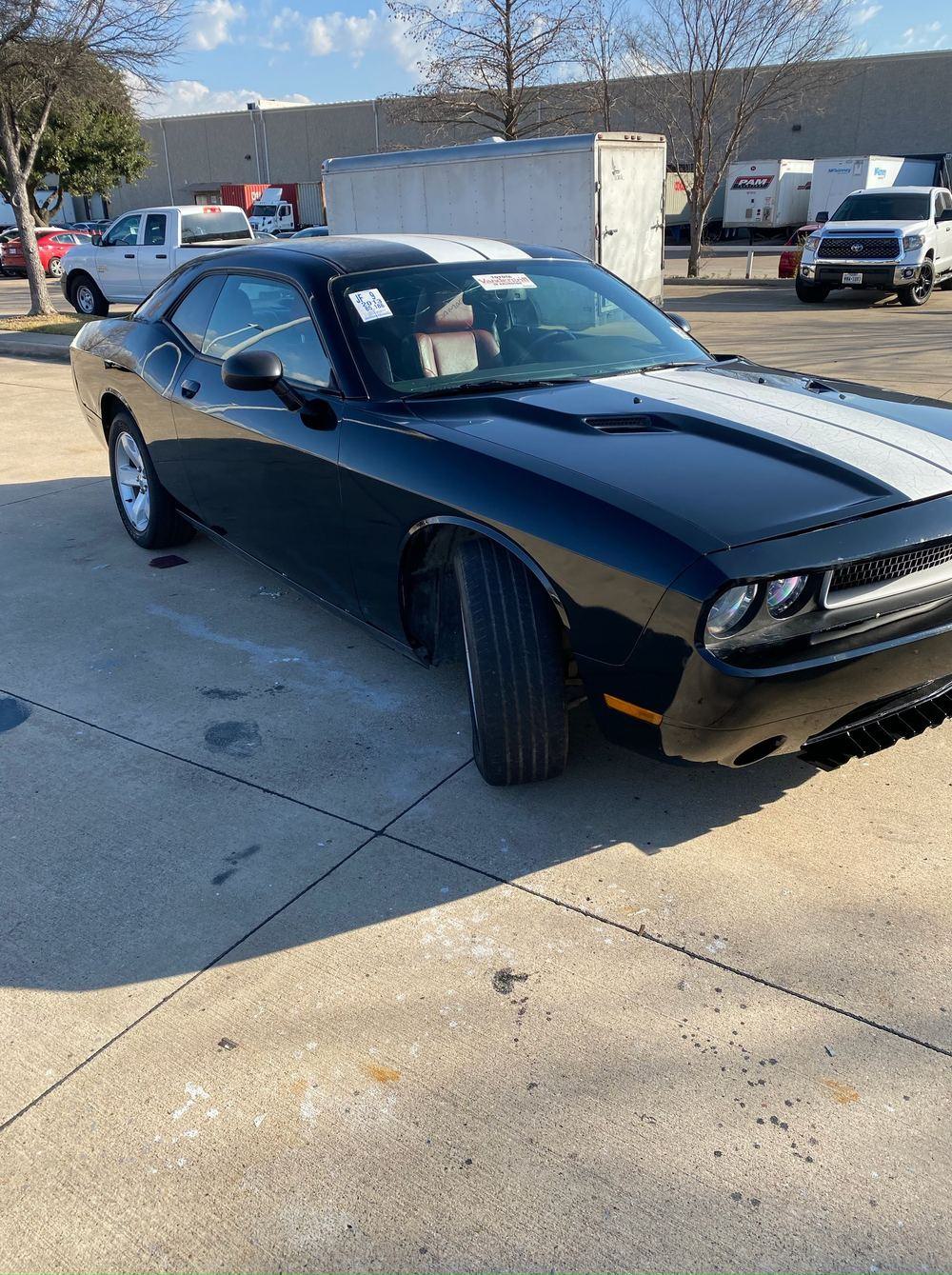 Dodge Challenger front end after repair, fascia and bumper back in place