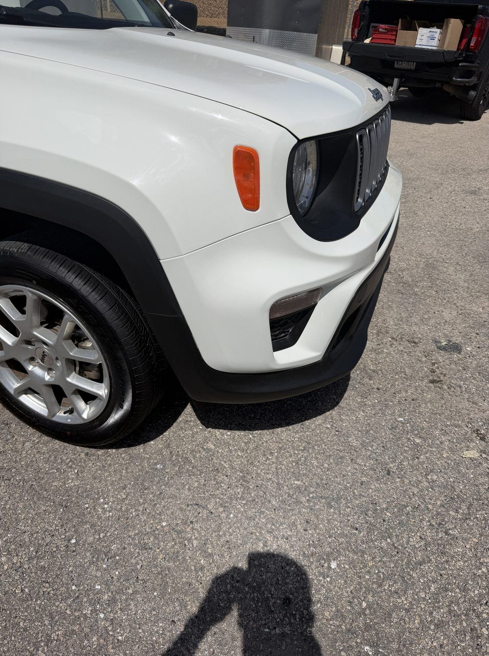 Jeep fender after repair, chips and clear coat gone from the edge